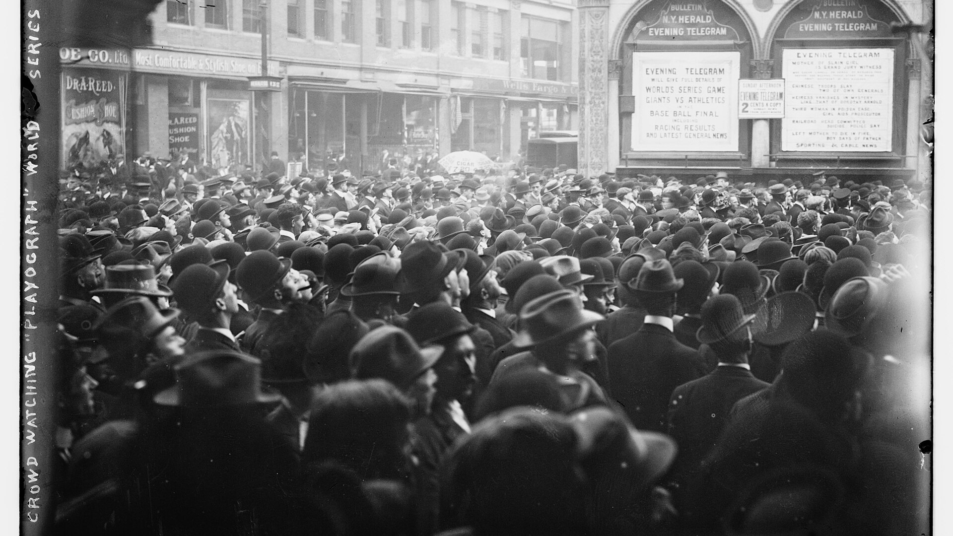 Crowd watching a playograph display during the 1911 World Series