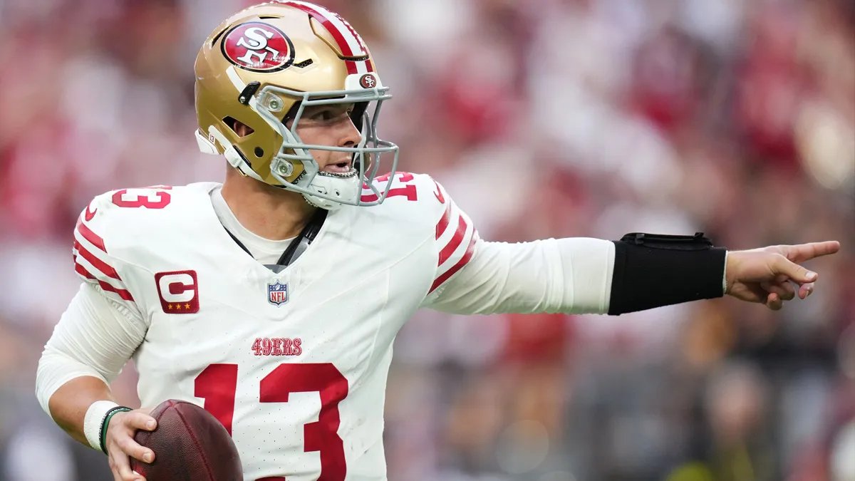 San Francisco 49ers quarterback Brock Purdy (13) in the white away uniform at Levi's Stadium.