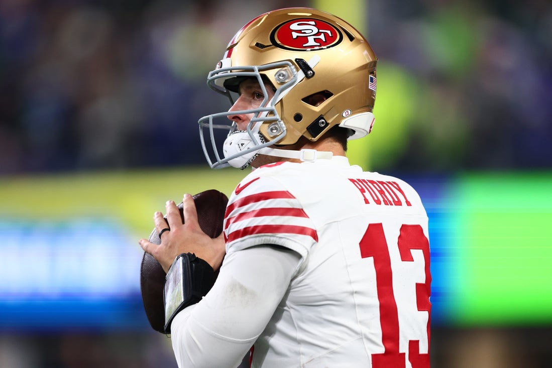 San Francisco 49ers quarterback Brock Purdy (13) surveys the defense before the snap.