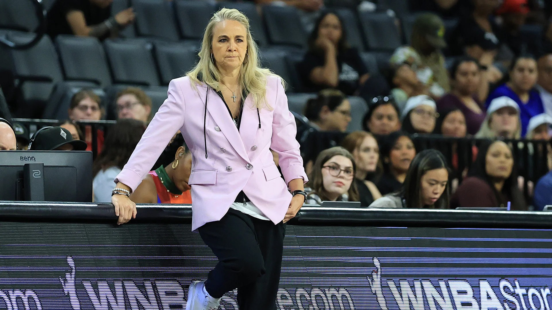 Becky Hammon coaching the Las Vegas Aces from the sideline