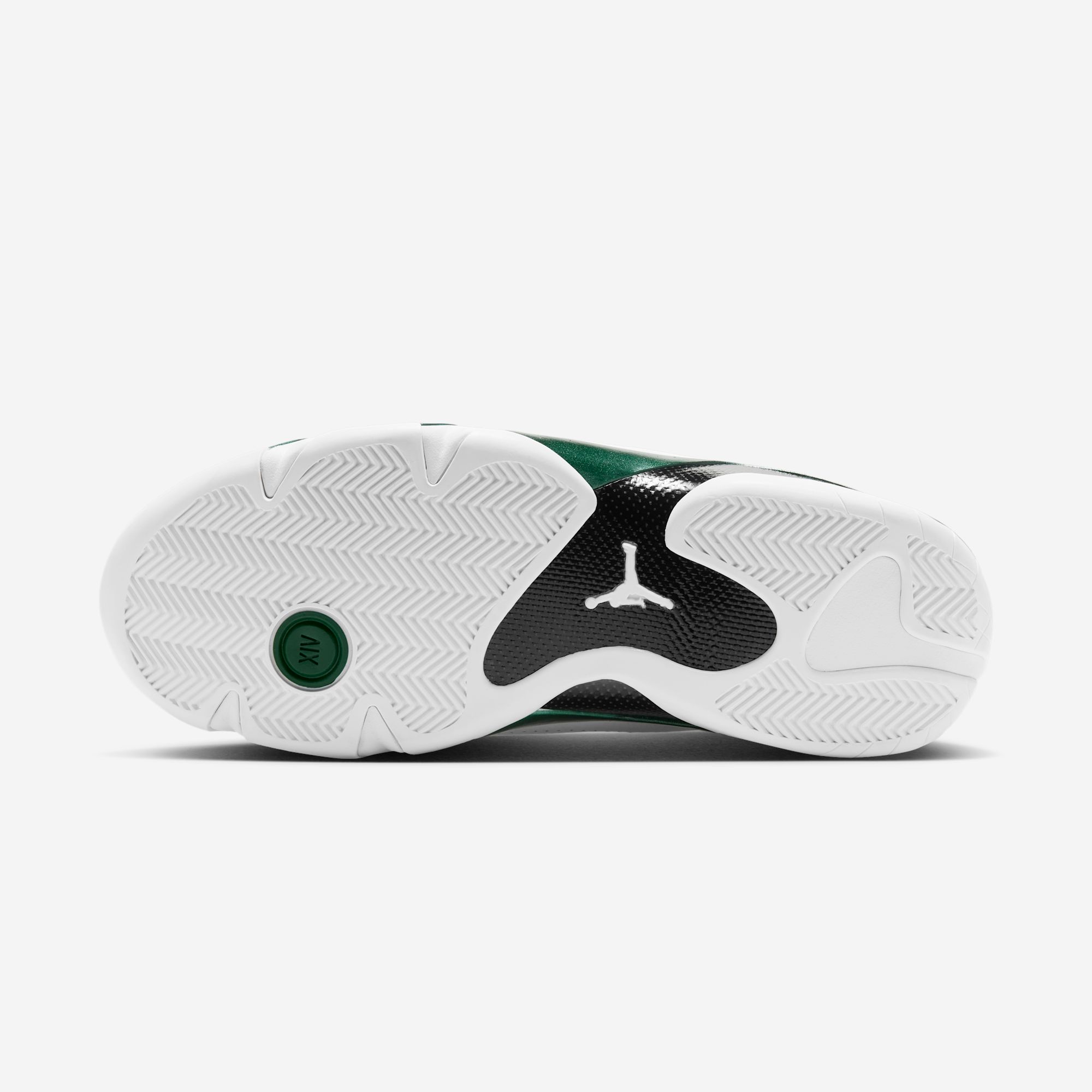 The outsole of the “Forest Green” 14 — herringbone tread, the black carbon shank with its white Jumpman, the green XIV pod at the forefoot