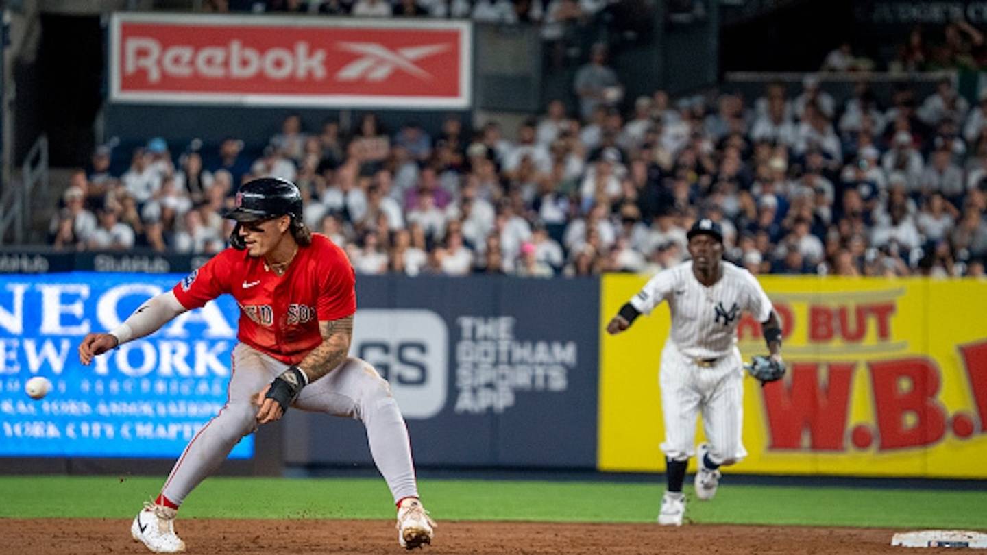 New York Yankees players during a game.