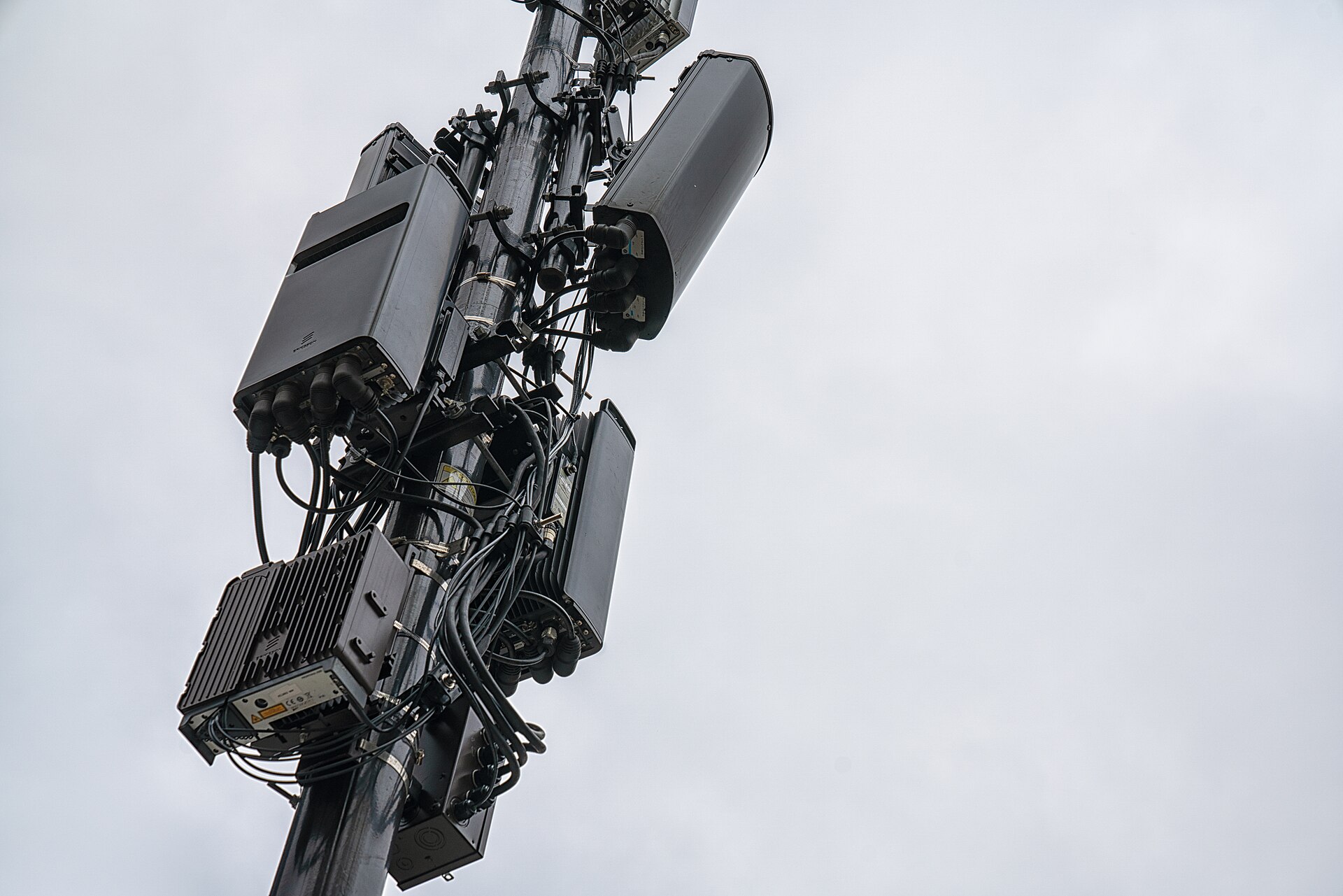 Cellular antennas on a mobile network tower against a bright sky (file photo)