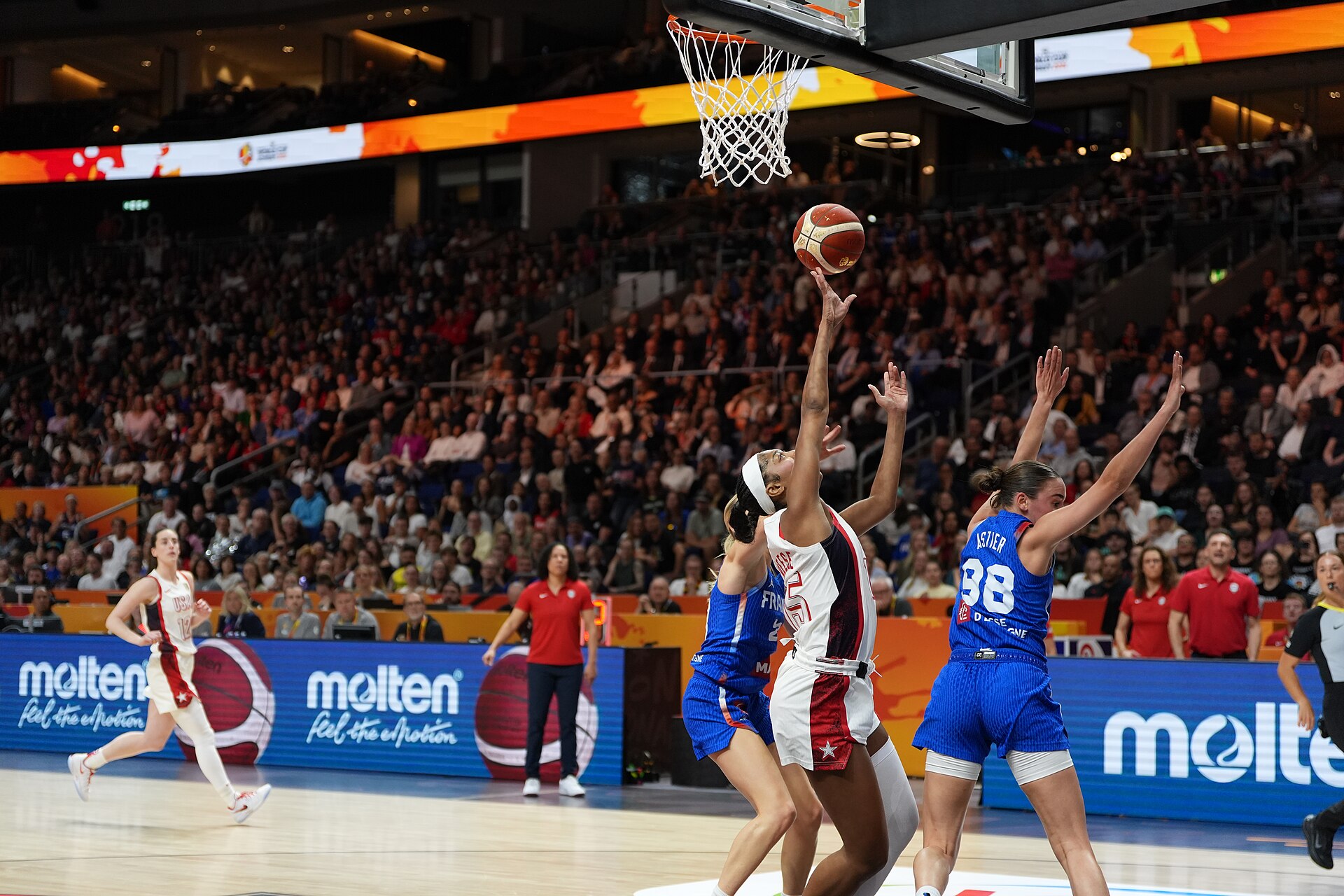 Angel Reese finishes at the rim for the United States against France at the FIBA World Cup in September 2026