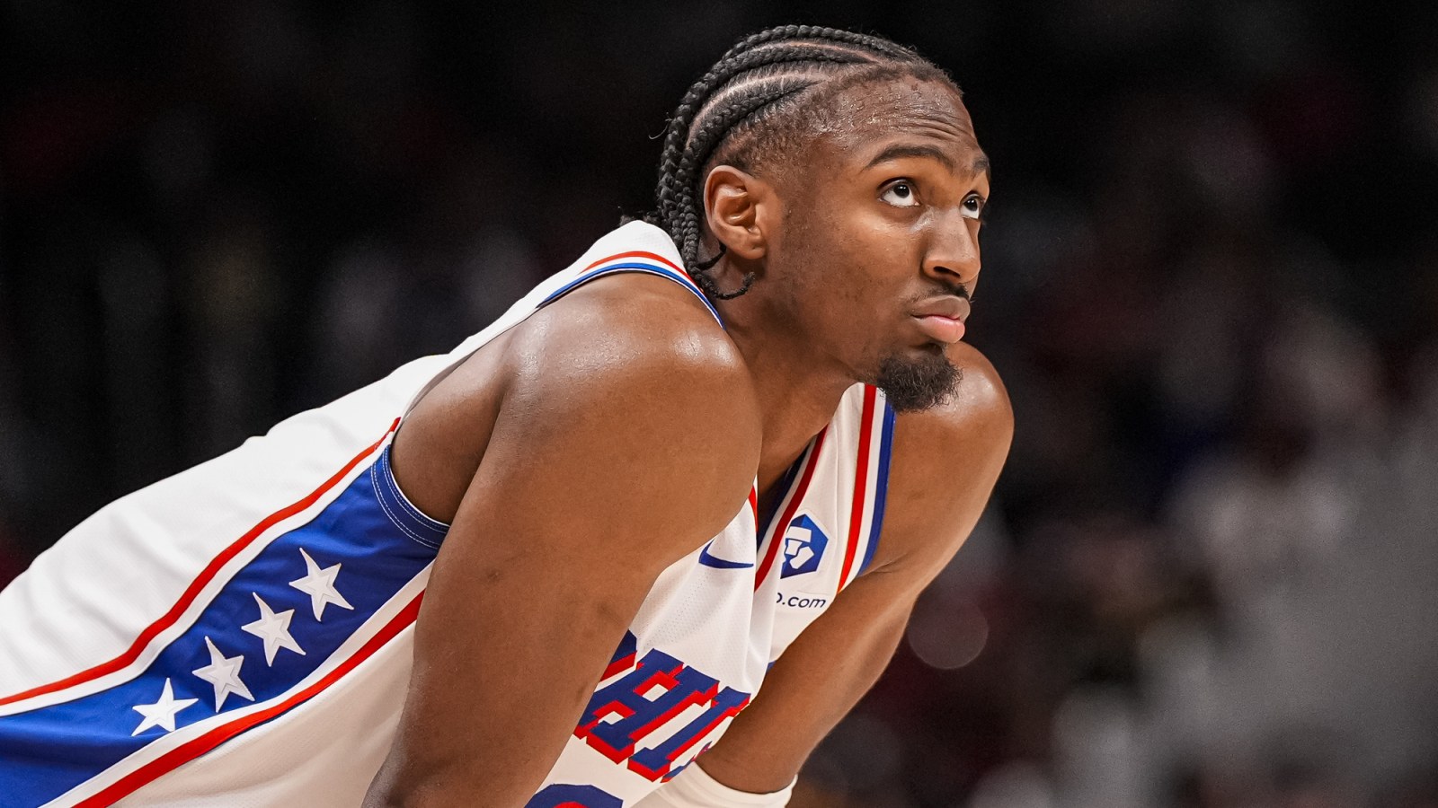 A 76ers player in action during a March 2026 game in Atlanta