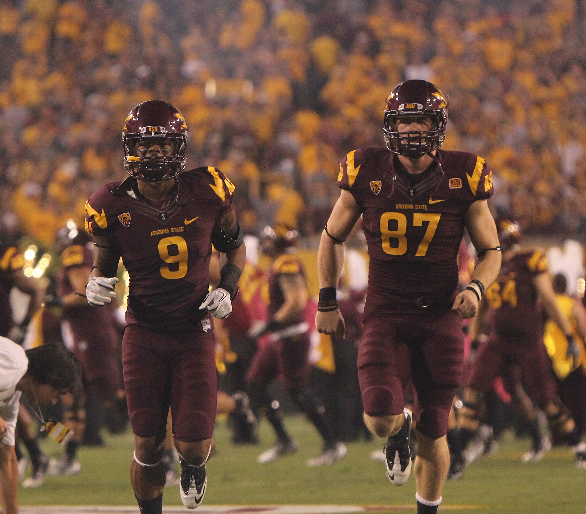 Arizona State players take the field at Sun Devil Stadium