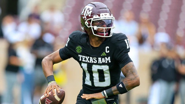 Texas A&M quarterback Marcel Reed running the ball at Kyle Field.