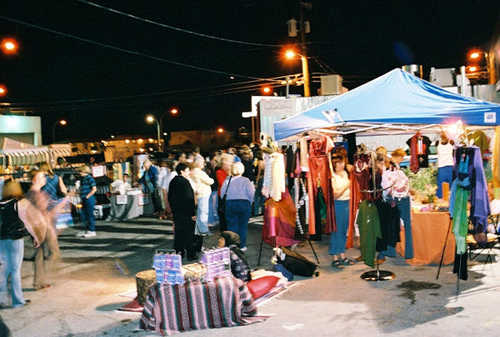 Visitors browsing artwork during First Friday in the 18b Las Vegas Arts District
