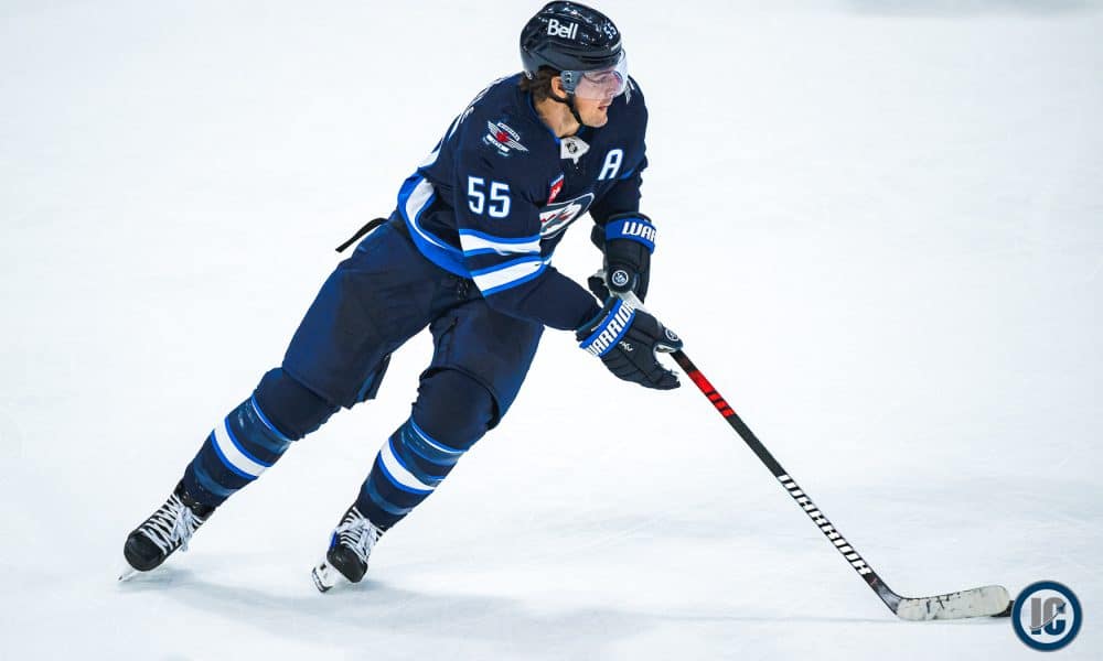 Winnipeg Jets center Mark Scheifele skates with the puck.