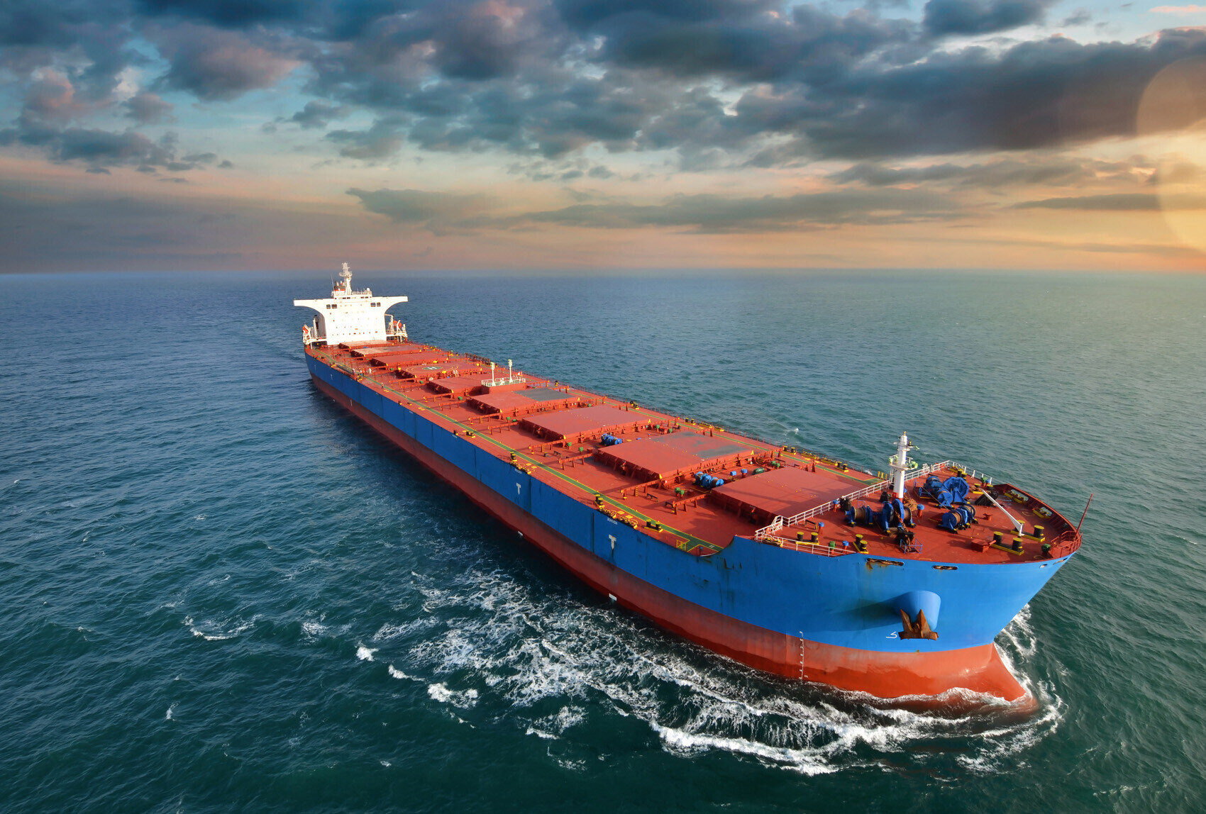 A bulk carrier vessel sailing in open water