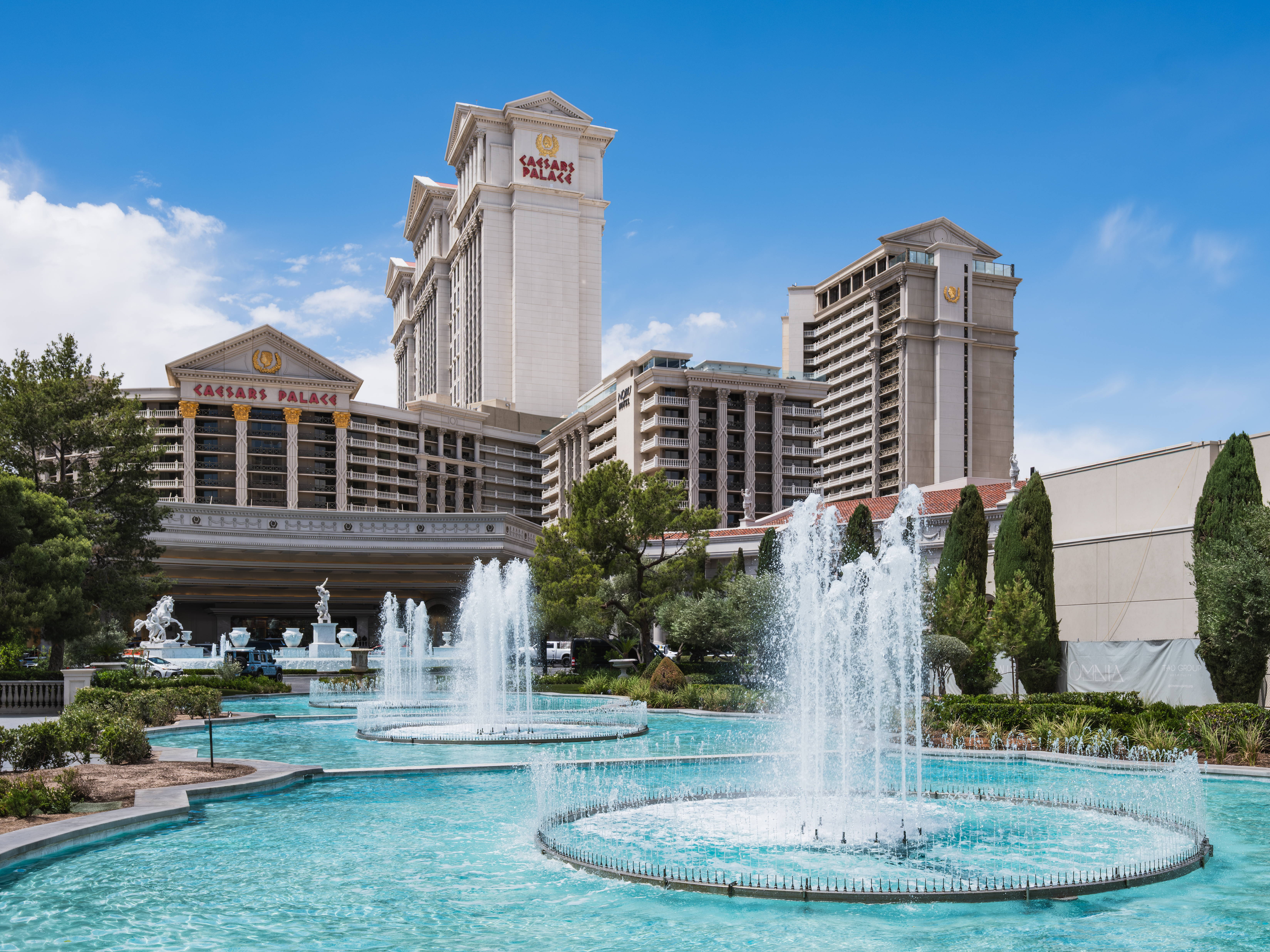 Caesars Palace and its fountains in daylight