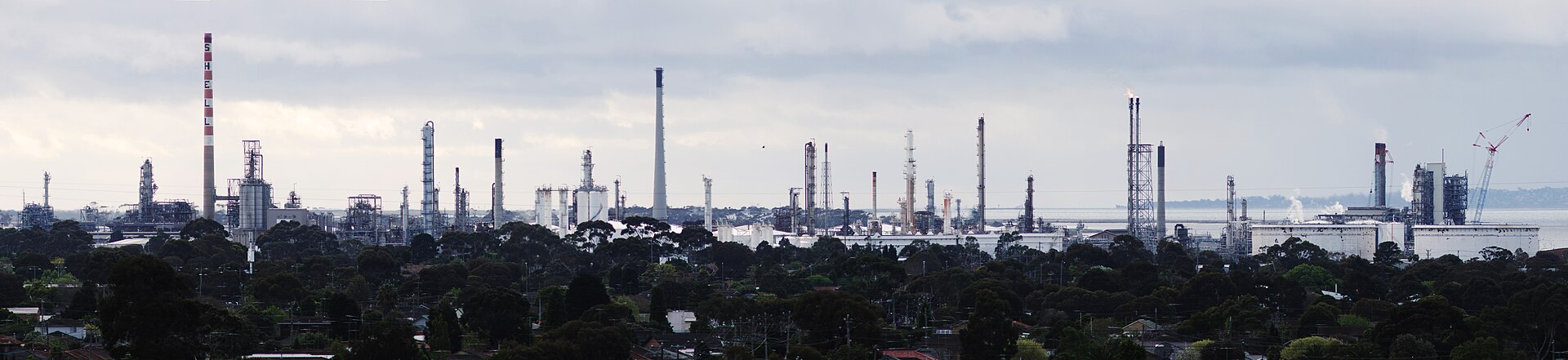 An oil refinery seen from a highway