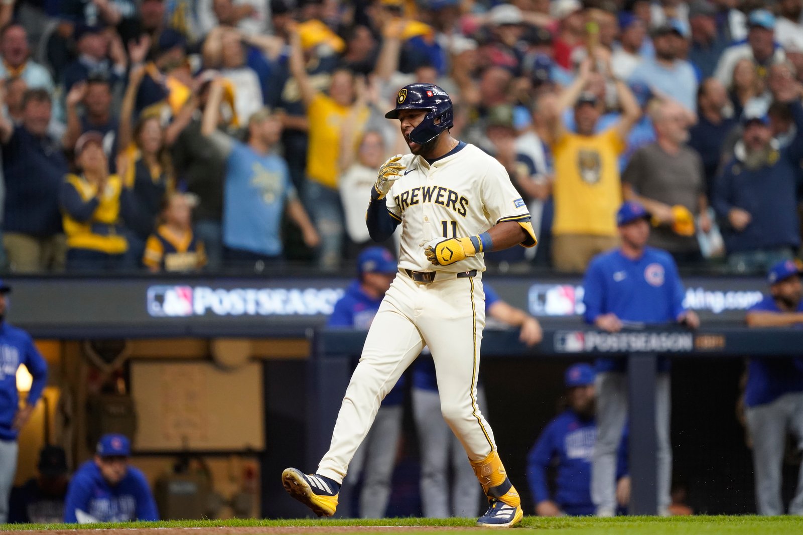 Milwaukee Brewers outfielder Jackson Chourio (11) celebrates in front of a roaring crowd at American Family Field.