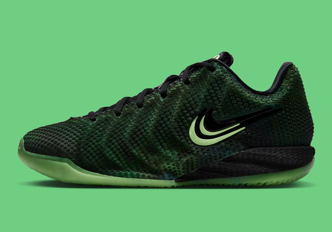 Side profile of the Nike Caitlin 1 Jinx in black with Ghost Green and Mint Foam accents