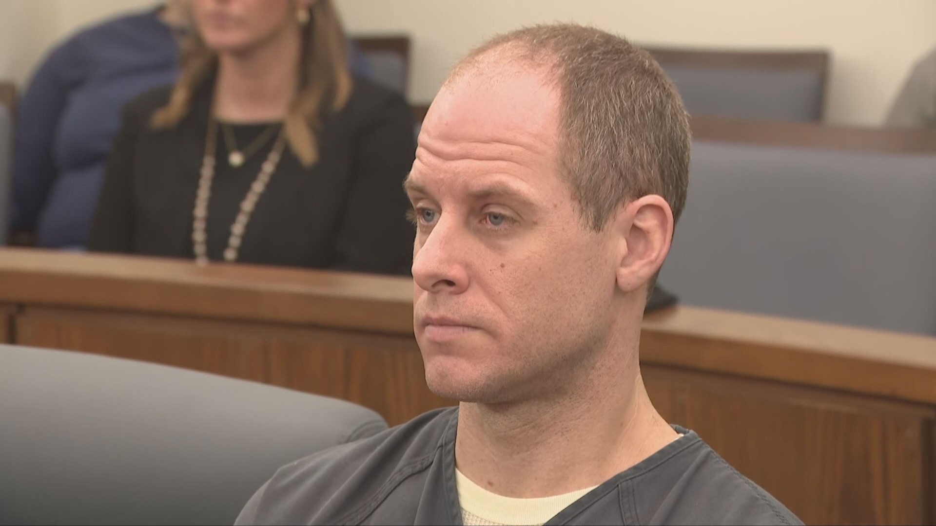 Caleb Flynn seated in a Miami County courtroom during his murder trial — real courtroom coverage