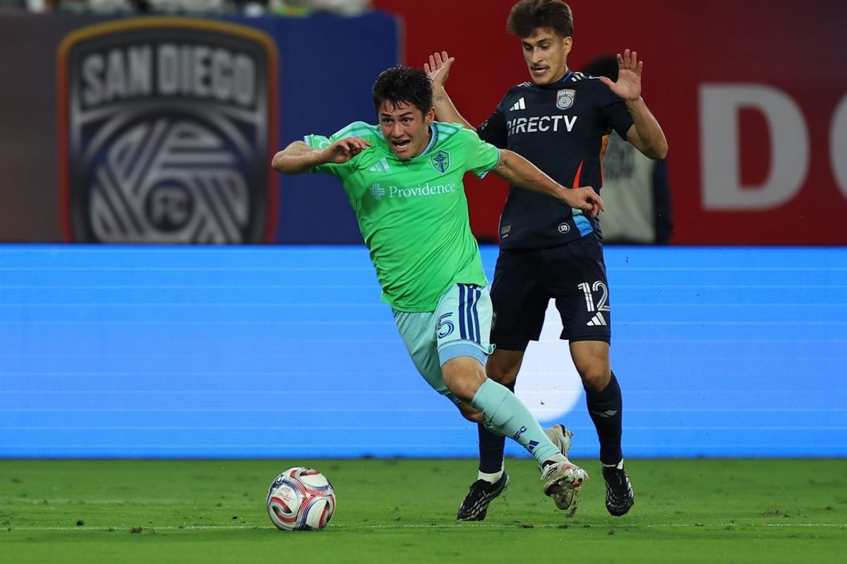 Seattle Sounders FC defender Kalani Kossa-Rienzi controls the ball under pressure from San Diego FC midfielder Gabriel Pirani during the first half at Snapdragon Stadium in San Diego on October 24, 2026