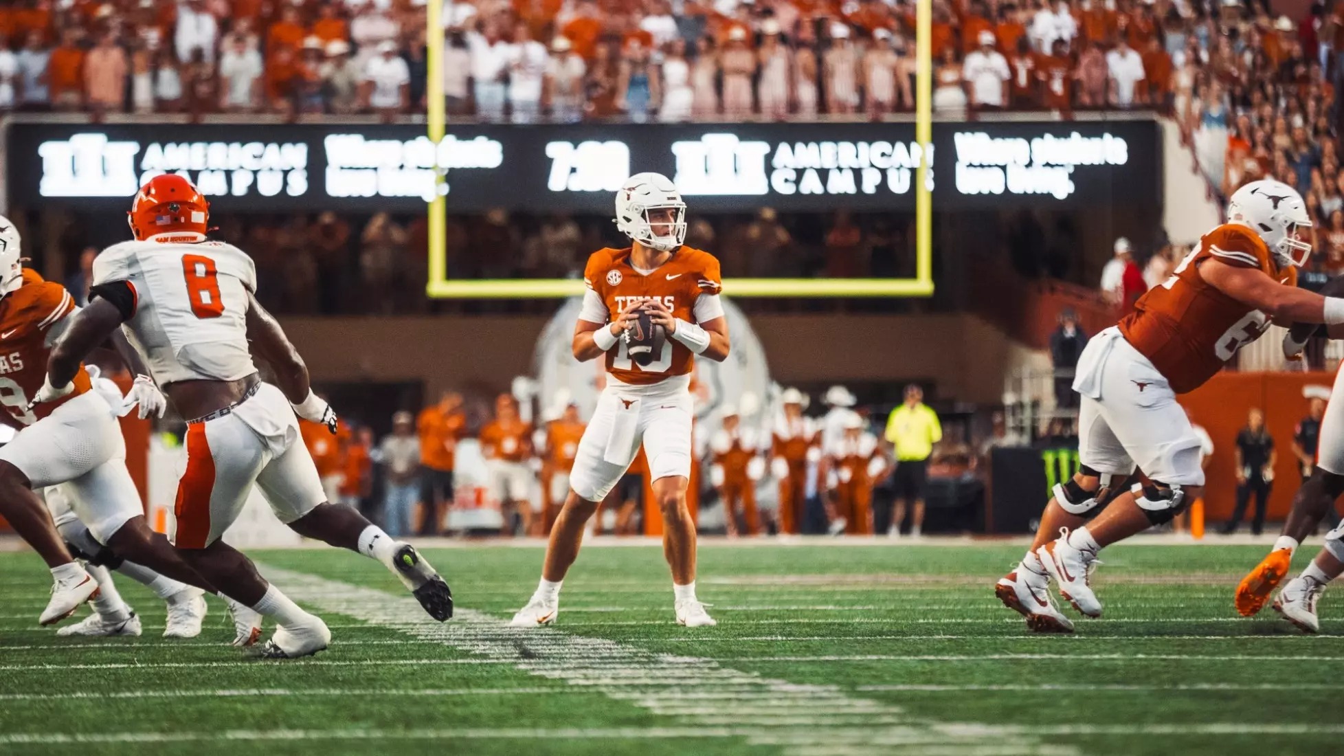 Texas quarterback Arch Manning in the burnt orange No. 16 jersey -- two fourth-quarter interceptions in the Red River loss sent his Heisman odds tumbling