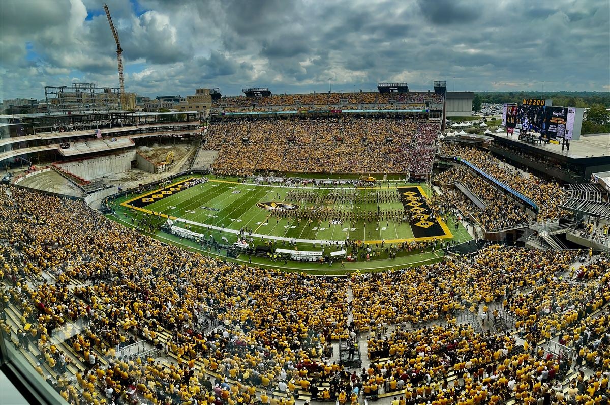 Faurot Field in Columbia, Missouri, packed with a gold-clad crowd on a bright afternoon