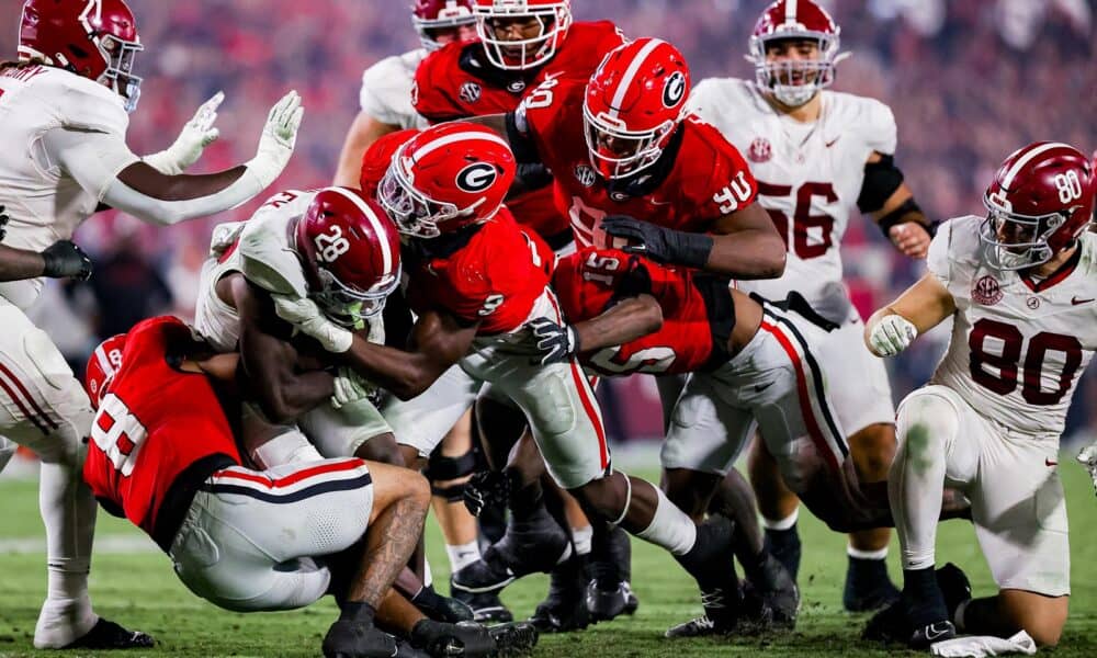 Alabama and Georgia players collide at the line of scrimmage -- the Crimson Tide could have tight end Josh Ford back from a broken forearm for Saturday's showdown with the Bulldogs