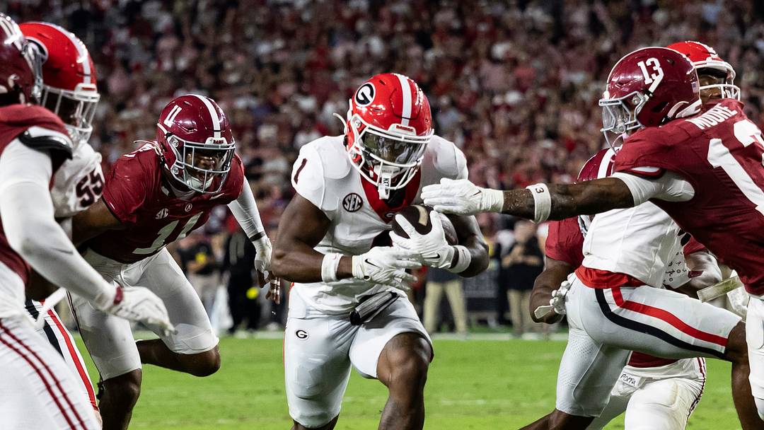 Georgia vs. Alabama game action (file photo) — Power 4 title games could be eliminated under the 24-team model