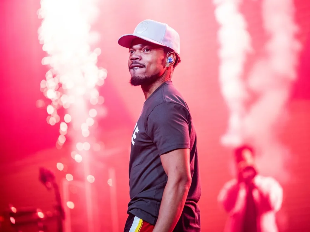 Chance the Rapper performing live on stage with pyrotechnics