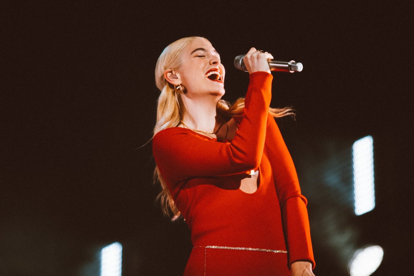Lorde performing live on stage