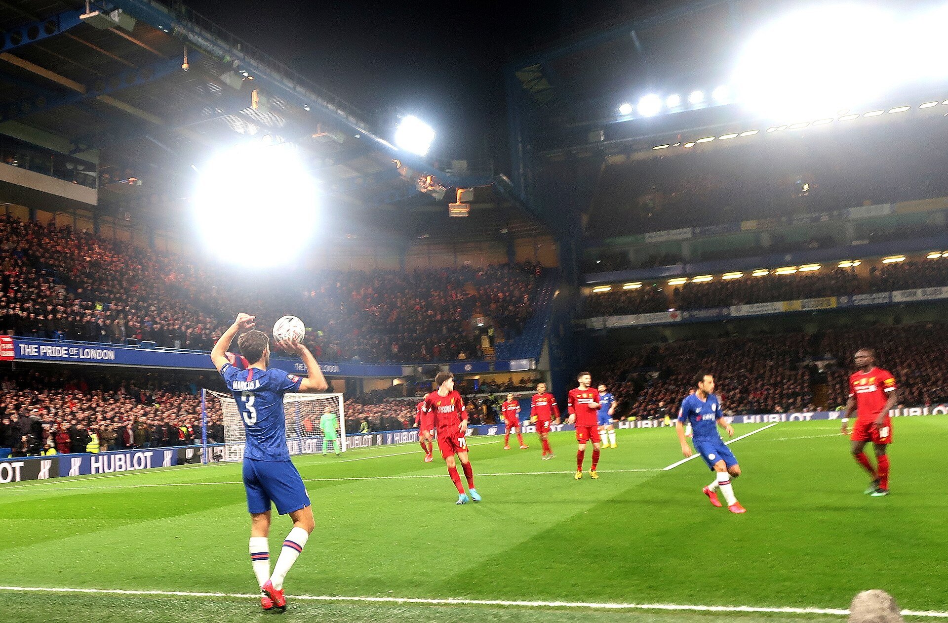 Chelsea and Liverpool players battle for the ball at Stamford Bridge