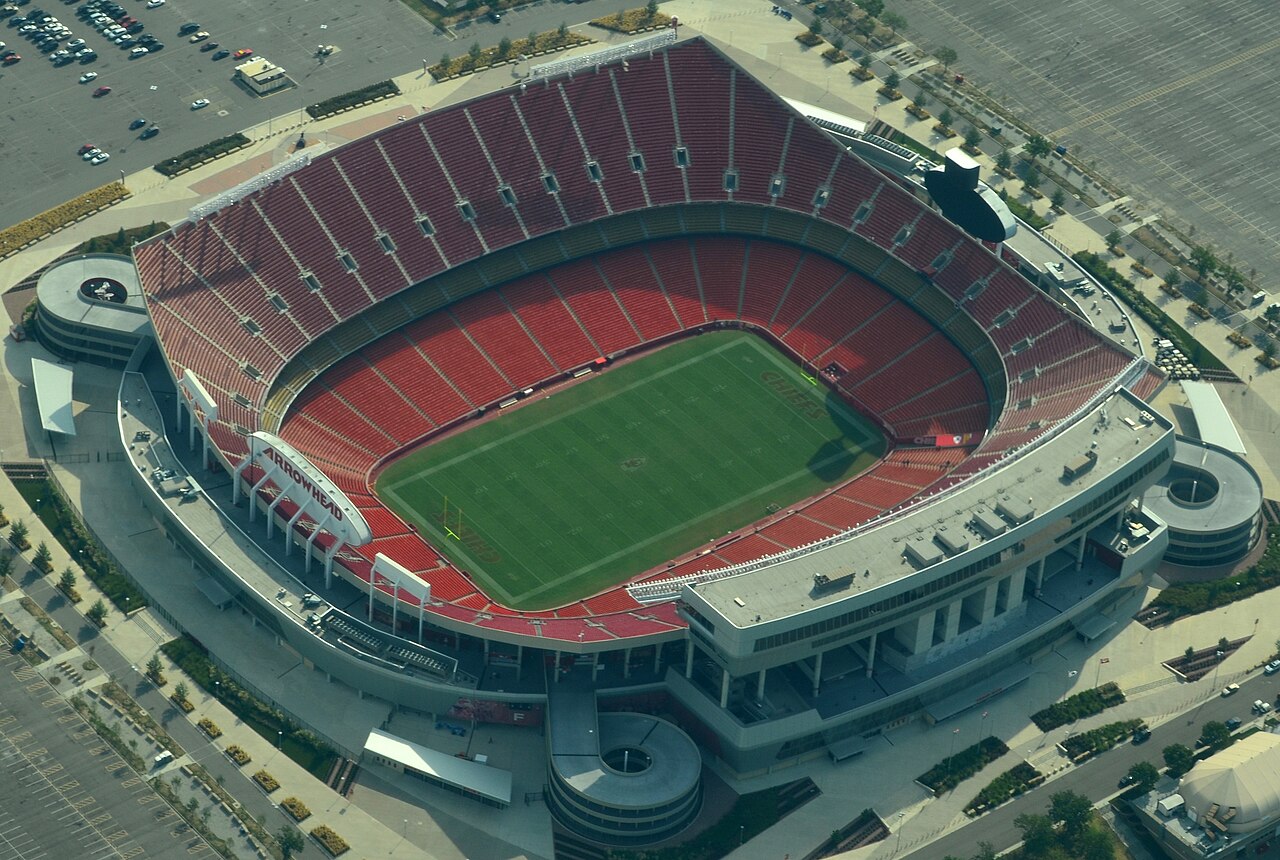 Aerial view of Arrowhead Stadium in Kansas City, Missouri, home of the Kansas City Chiefs, on a bright day.