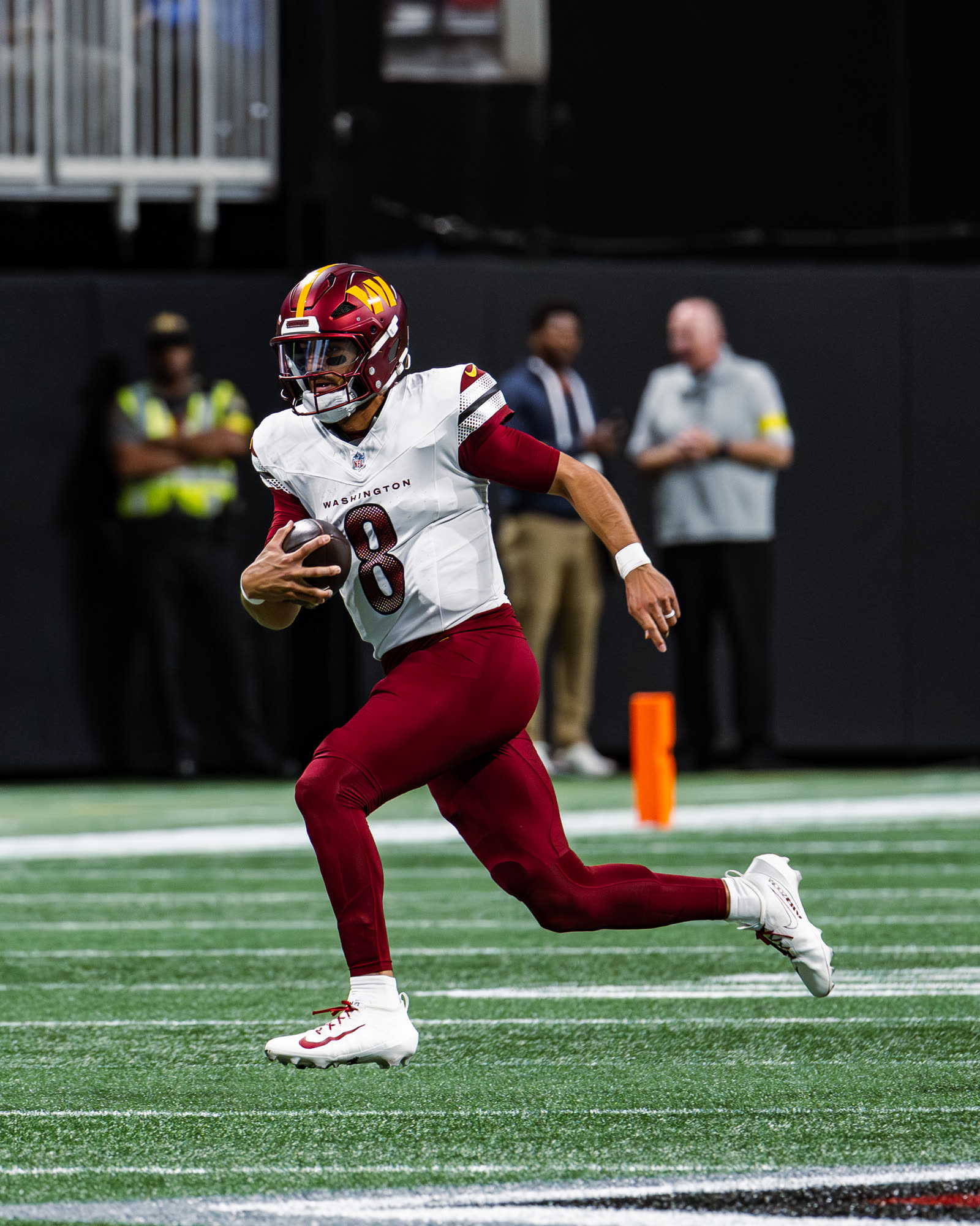 Marcus Mariota scrambling for the Washington Commanders