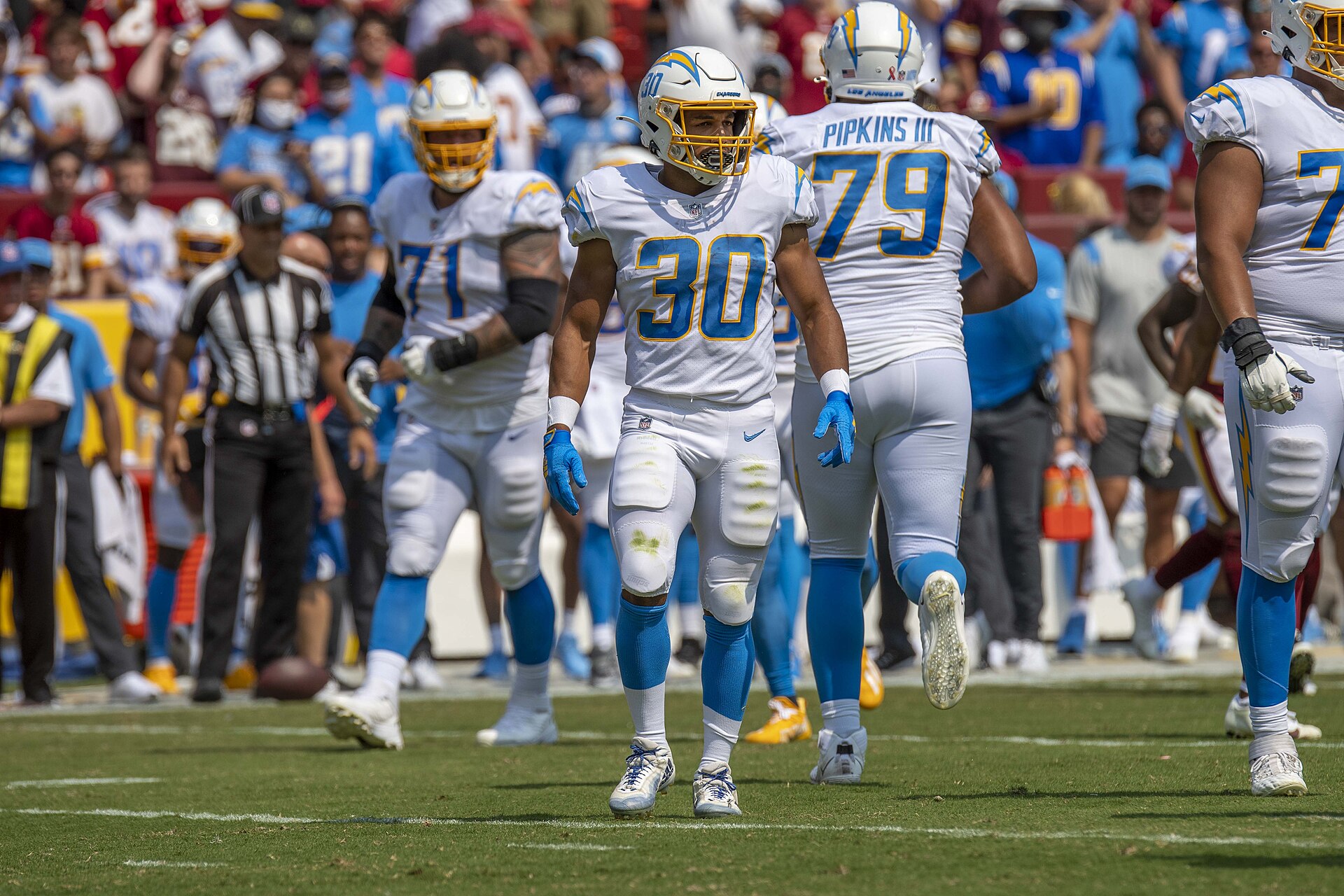 Running back Austin Ekeler carrying the football during an NFL game