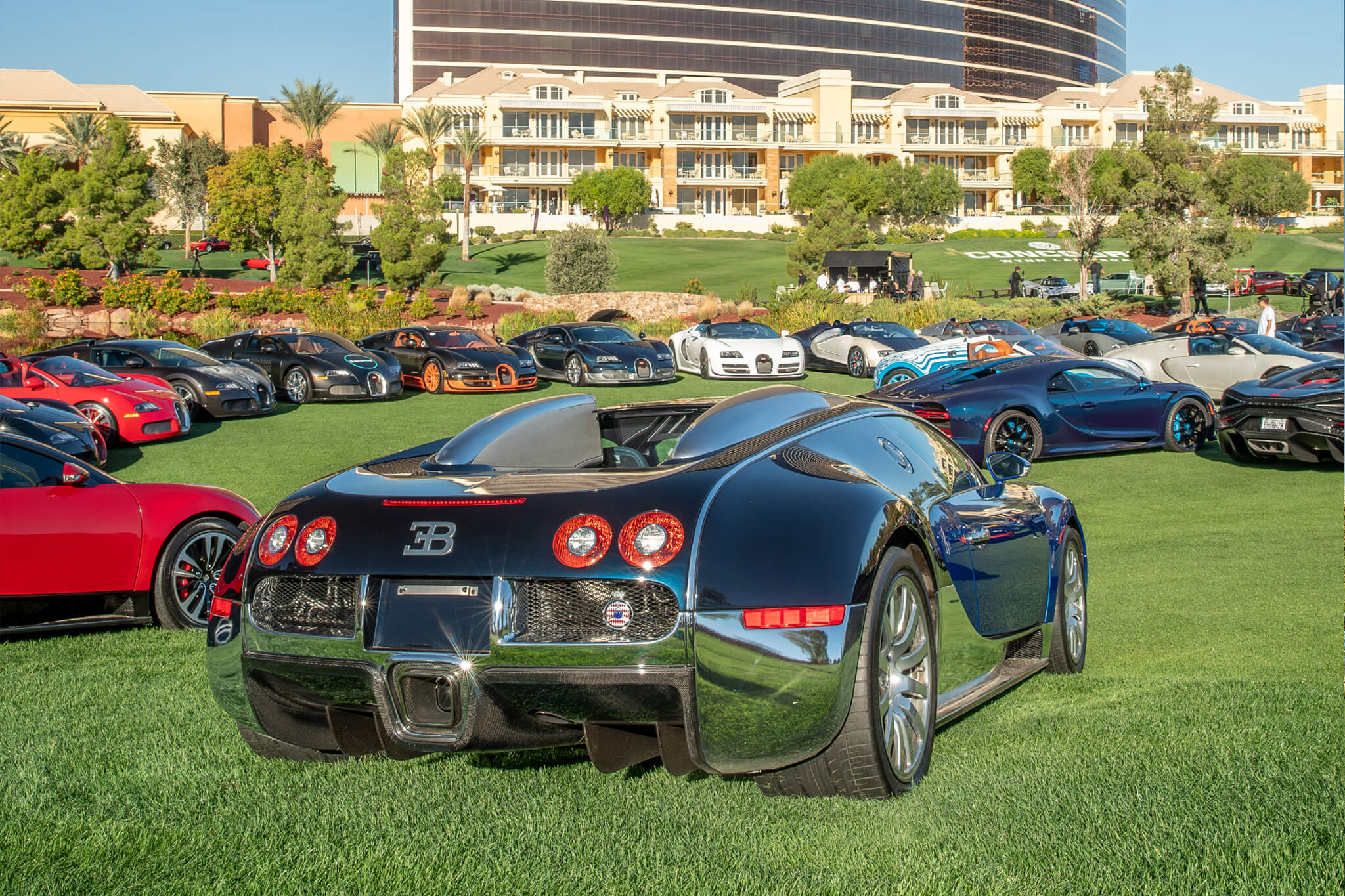 Dozens of Bugattis — Veyrons and Chirons — arrayed on the Wynn Golf Club fairways at the 2025 Concours, the largest Bugatti gathering in history