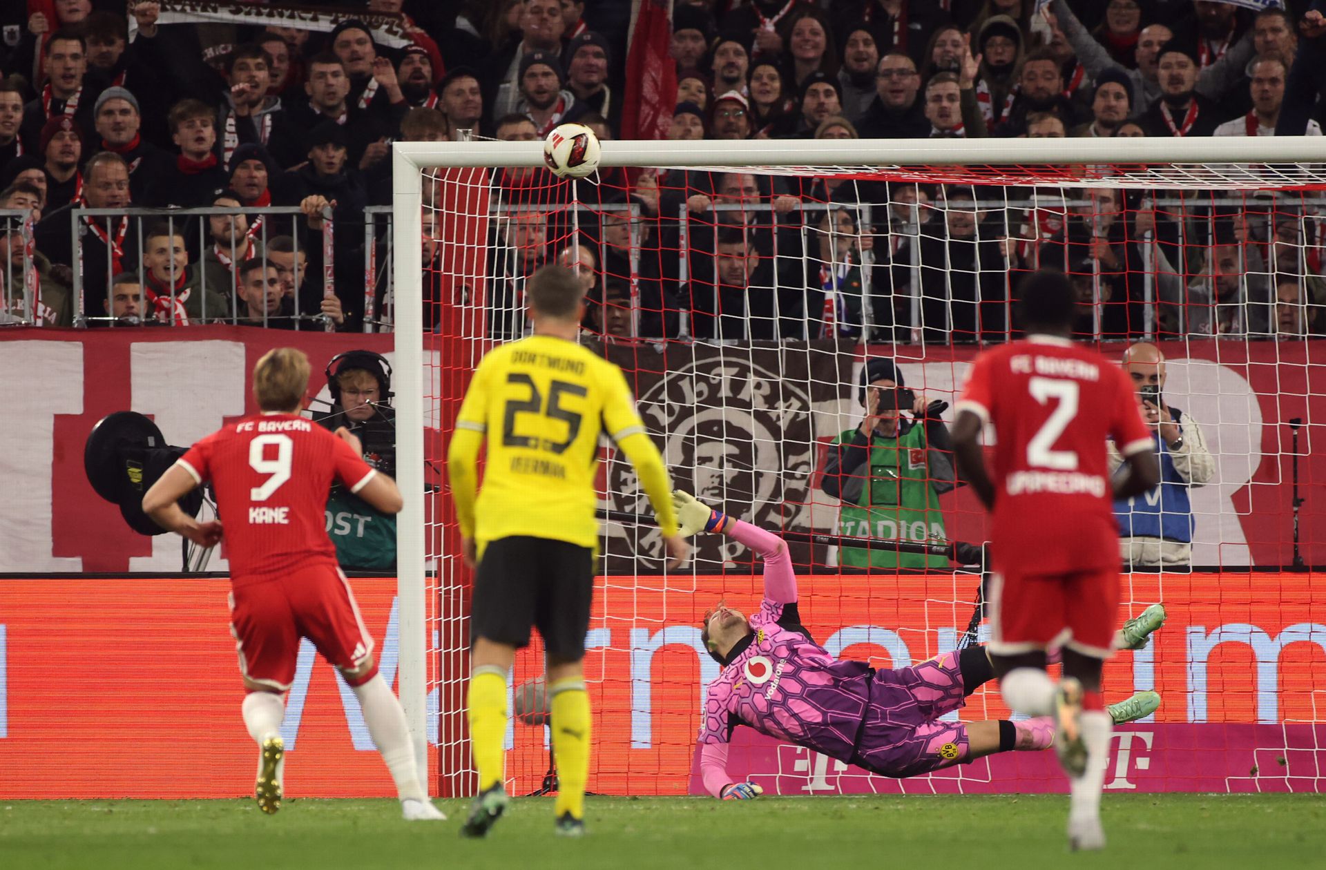 Harry Kane watches his second-half penalty clip the crossbar for Bayern Munich against Borussia Dortmund in Der Klassiker at the Allianz Arena — the miss that swung a 2–2 classic