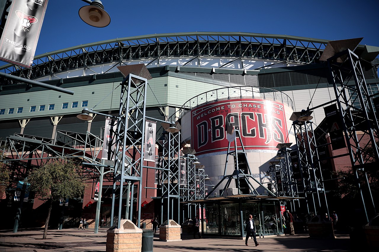 The exterior of Chase Field in Phoenix under a clear desert sky, home of the Arizona Diamondbacks.
