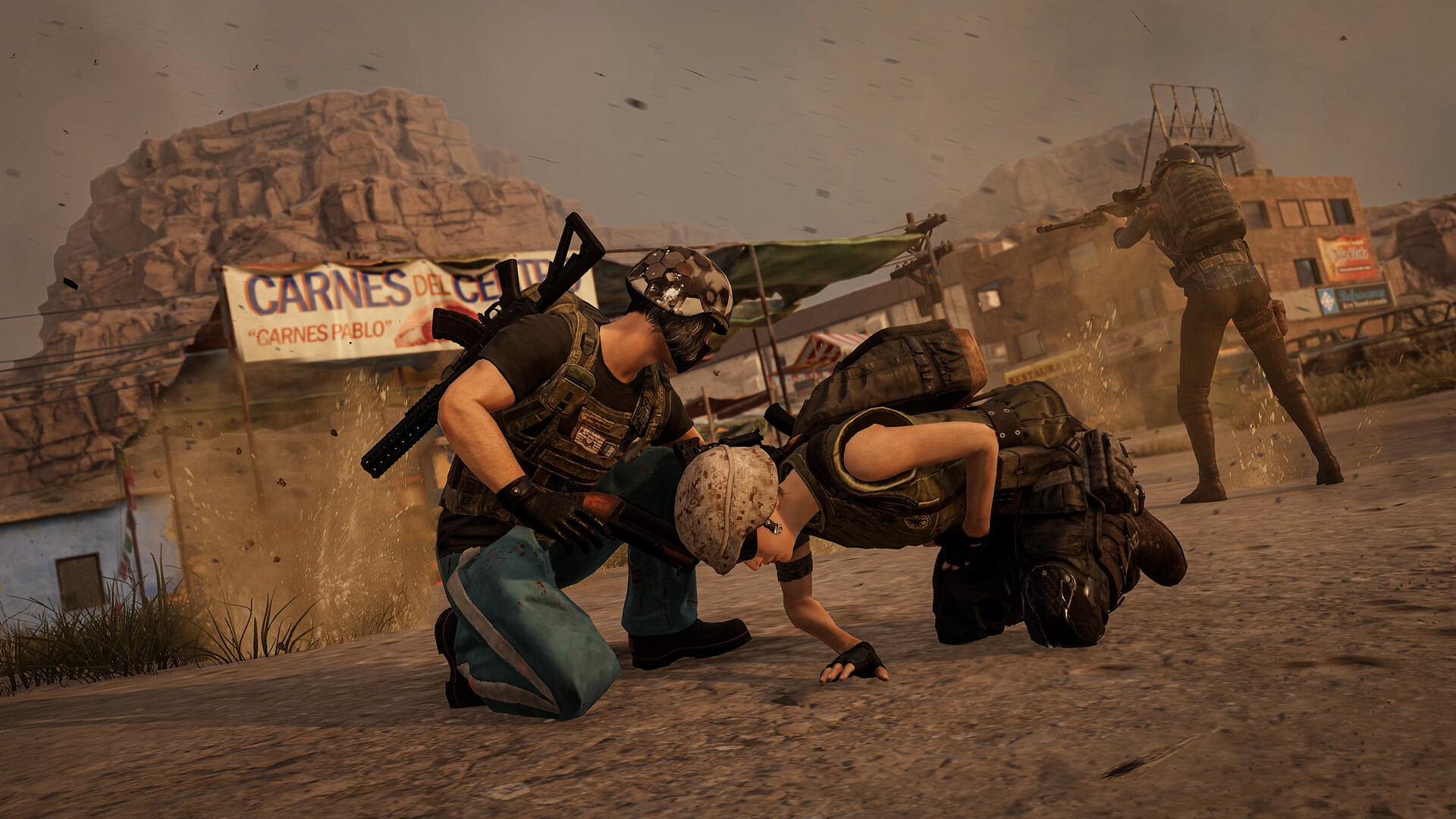 Official PUBG gameplay screenshot — a downed player being revived in a desert town firefight on Miramar