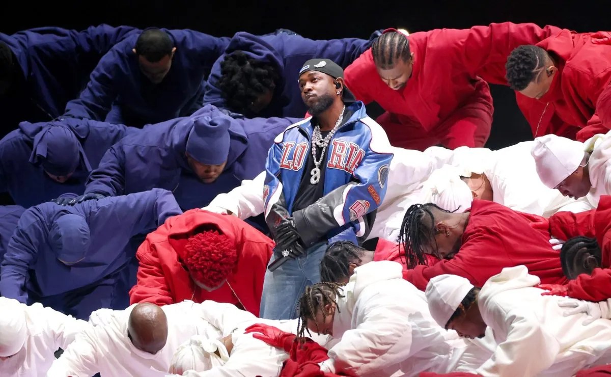 Kendrick Lamar performing on stage during the Super Bowl halftime show