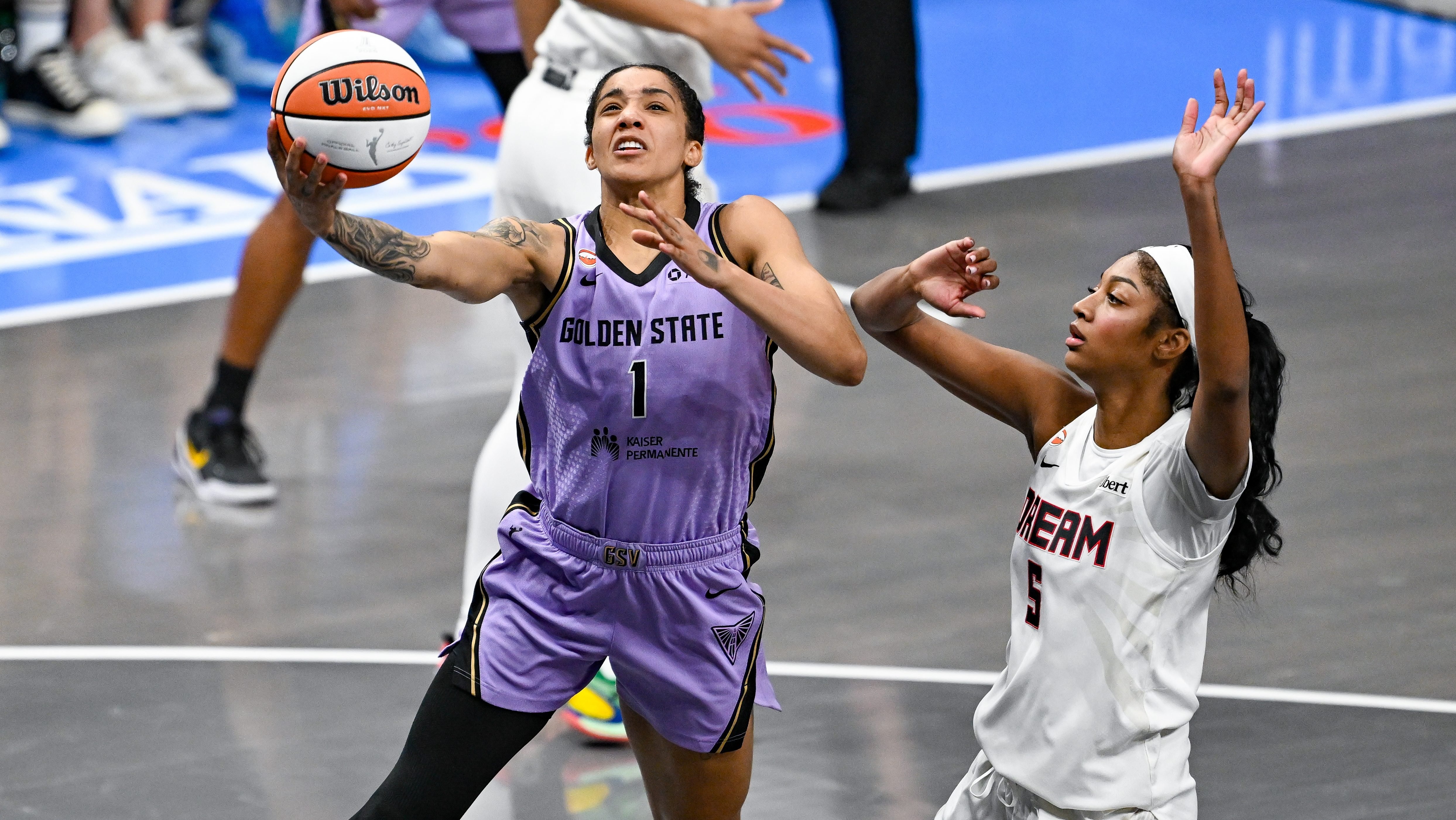 Angel Reese of the Atlanta Dream defends a Golden State Valkyries drive during the 2026 WNBA Finals