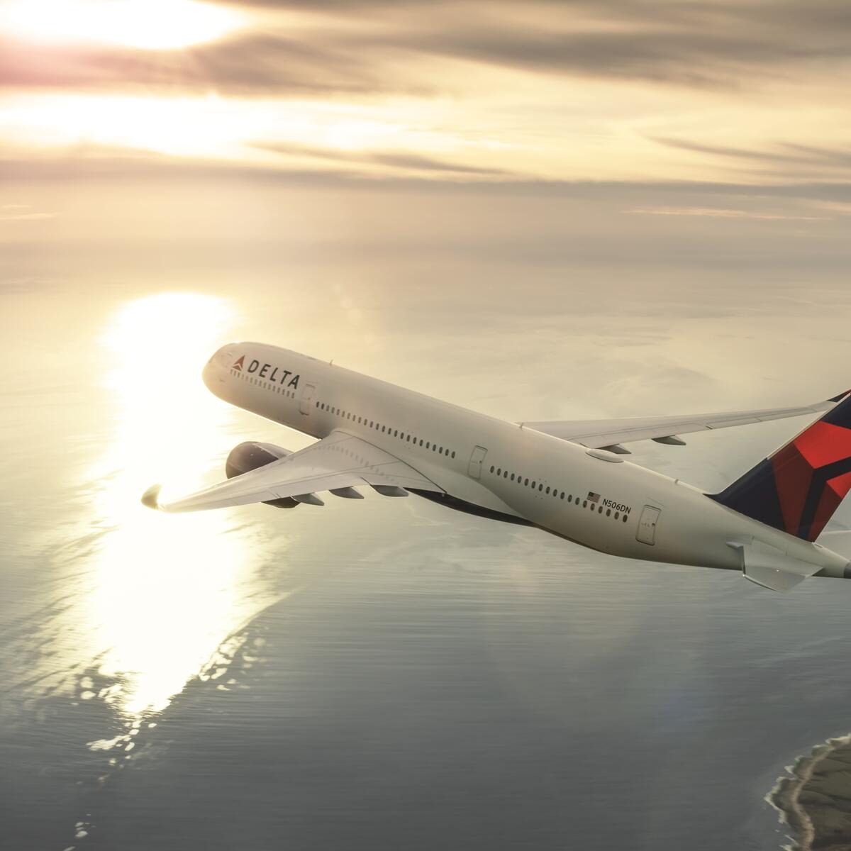 A Delta Air Lines Airbus A350 in flight — Delta reports Friday as the first major airline to post quarterly results.