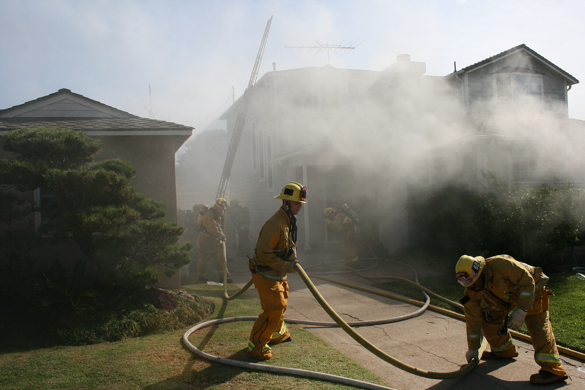 Los Angeles Fire Department firefighters and apparatus at work