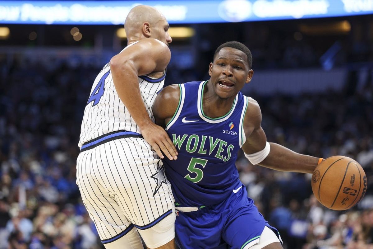 Anthony Edwards of the Minnesota Timberwolves drives with the ball against Jalen Suggs of the Orlando Magic in the third quarter at Kia Center in Orlando on October 23, 2026