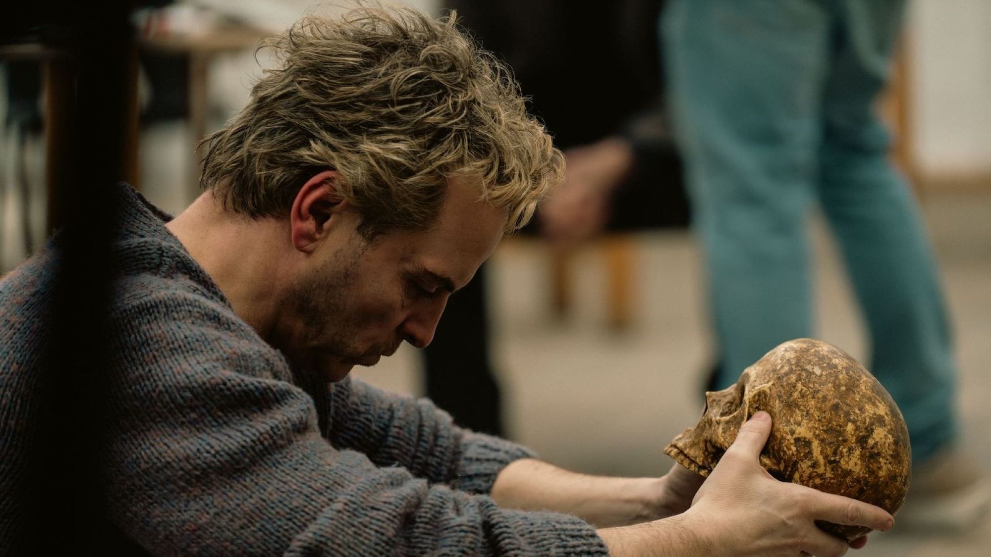 Andrew Scott as Ian Charleson in Elsinore, holding the Yorick skull during rehearsals for Hamlet