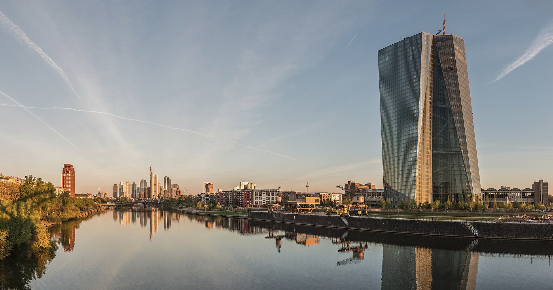 The European Central Bank and the Frankfurt skyline at dawn
