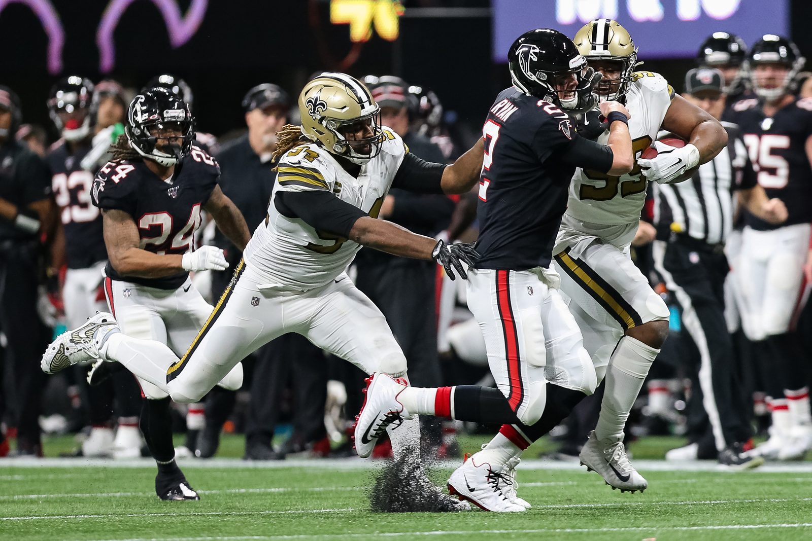 Atlanta Falcons and New Orleans Saints players in NFL action at the Caesars Superdome — Atlanta ran for 205 yards in a 45-24 Monday Night Football rout.