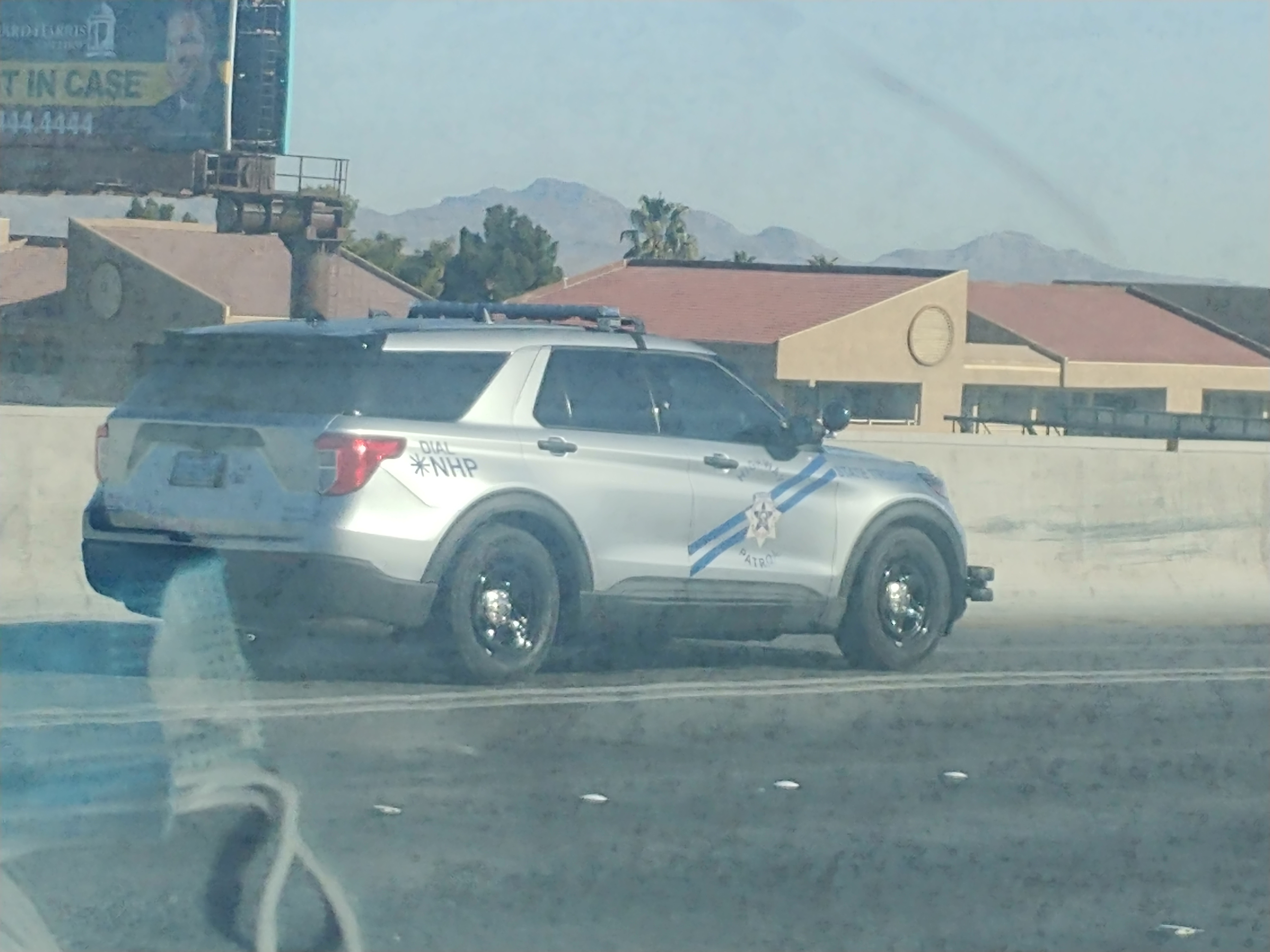 A Nevada Highway Patrol cruiser, the agency investigating the rollover