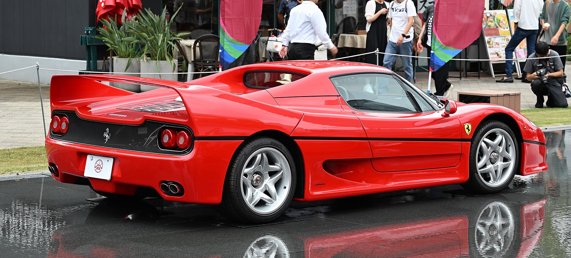 A Ferrari F50 from the rear, showing its wing and engine cover