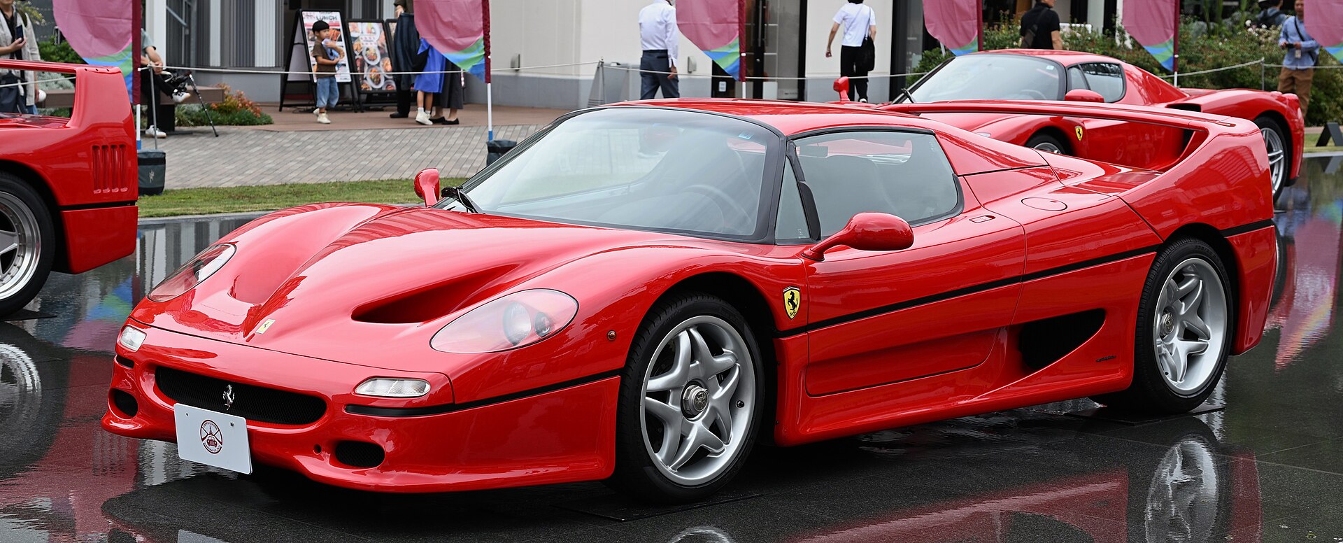 A red 1997 Ferrari F50, front three-quarter view