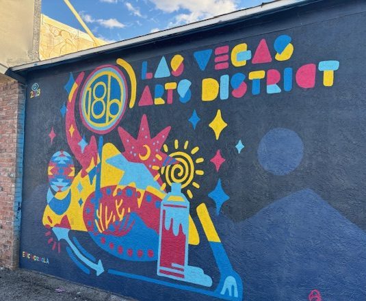 A colorful 18b Las Vegas Arts District mural painted on a building wall