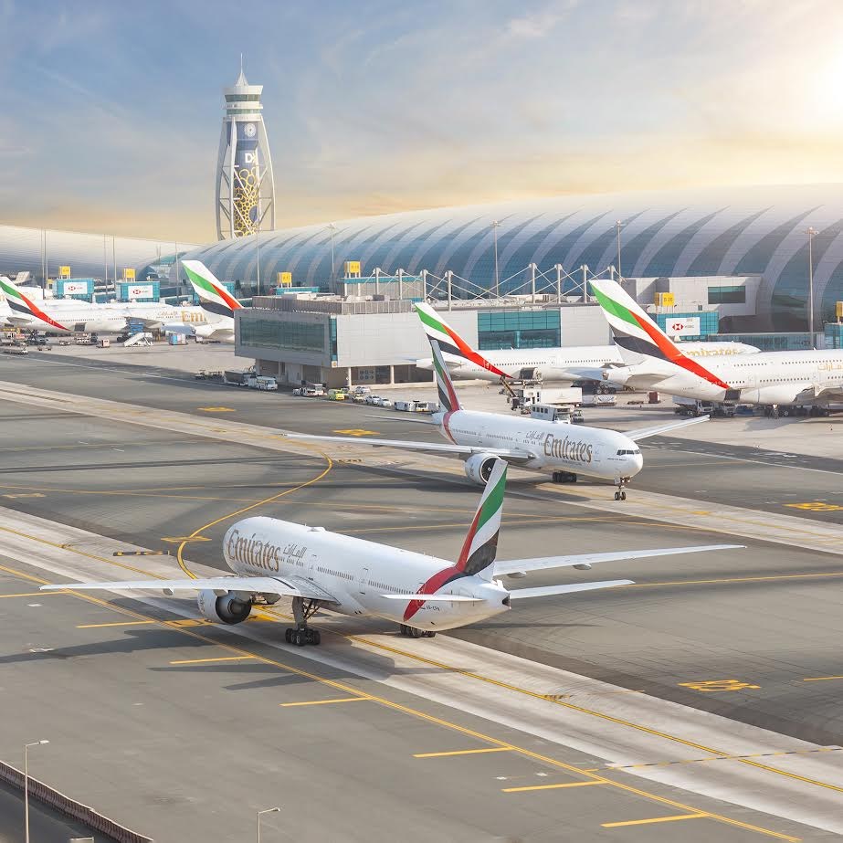 Aircraft on the tarmac at Dubai International Airport in daylight