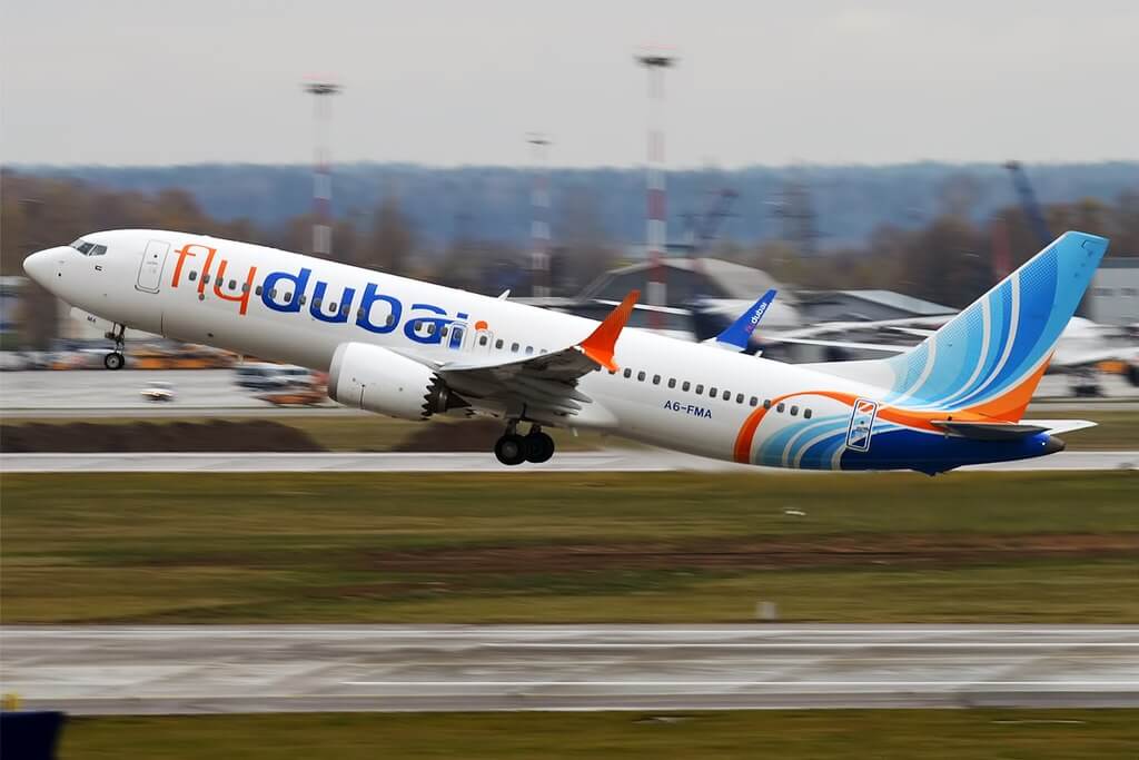 A flydubai Boeing 737 MAX 8 on the tarmac in daylight