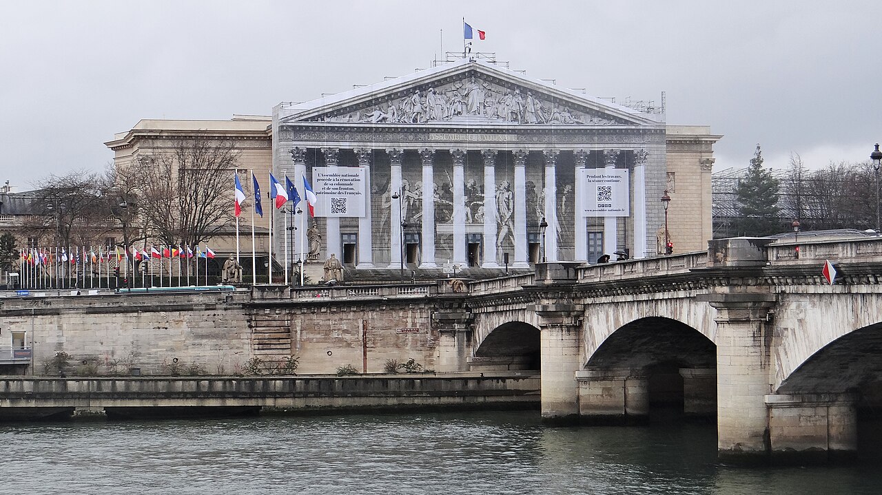 The Palais Bourbon, seat of the French National Assembly, across the Seine in Paris daylight