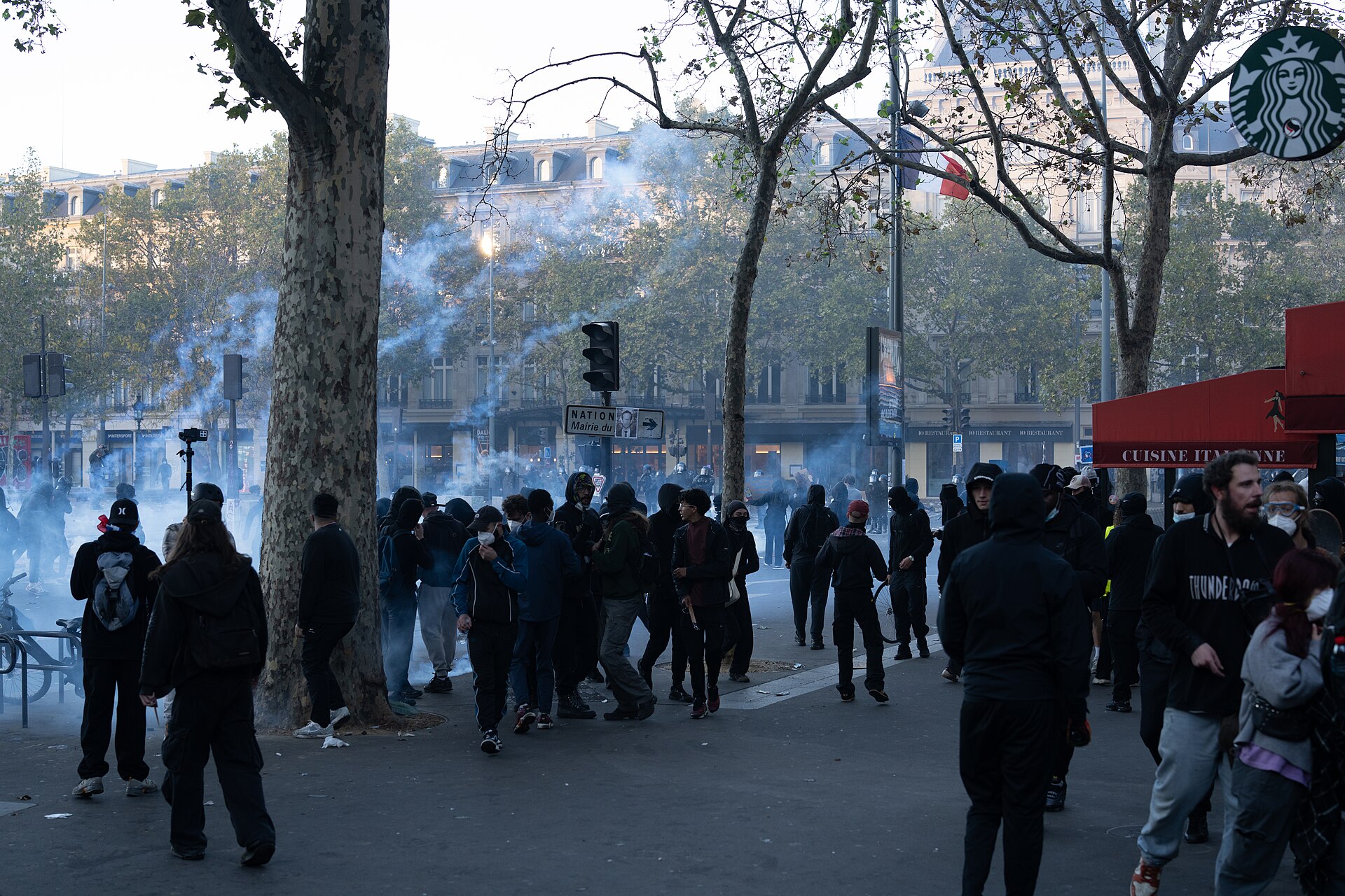 Crowd and tear gas at Place de la République in Paris during the October 17, 2026 protests